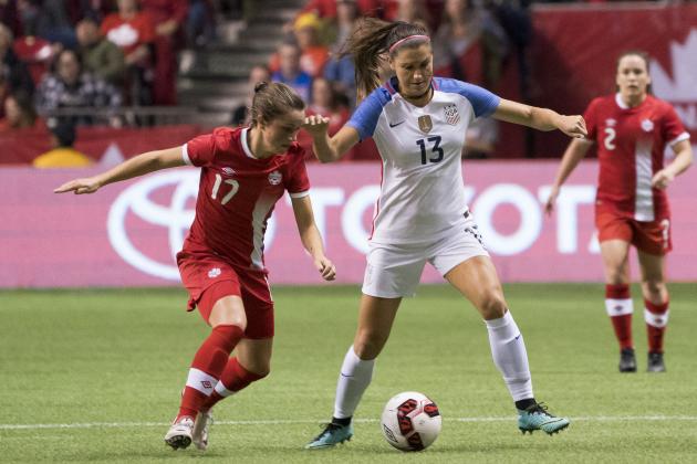 VANCOUVER, BC - NOVEMBER 09: Jessie Fleming #17 of Canada tries to check Alex Morgan #13 of the United States during International Friendly soccer match action at BC Place on November 9, 2017 in Vancouver, Canada. (Photo by Rich Lam/Getty Images)