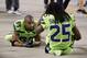 Seattle Seahawks wide receiver Doug Baldwin (89) and cornerback Richard Sherman (25) sit on the sidelines during the second half of an NFL football game against the Arizona Cardinals, Thursday, Nov. 9, 2017, in Glendale, Ariz. (AP Photo/Rick Scuteri)