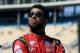 FILE - In this March 12, 2016, file photo, Darrell Wallace Jr. looks on from pit road during NASCAR Xfinity Series qualifying at Phoenix International Raceway in Avondale, Ariz. Darrell Wallace Jr. will become the first black driver to race at NASCAR's top level since 2006 when he replaces injured Aric Almirola this weekend at Pocono Raceway. (AP Photo/Ralph Freso, File)