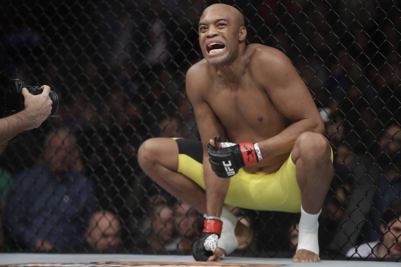 Anderson Silva, of Brazil, squats before a middleweight mixed martial arts bout against Derek Brunson at UFC 208 Saturday, Feb. 11, 2017, in New York. Silva won the fight. (AP Photo/Frank Franklin II)