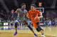 MANHATTAN, KS - FEBRUARY 22: Guard Jeffrey Carroll #30 of the Oklahoma State Cowboys drives against guard Wesley Iwundu #25 of the Kansas State Wildcats during the first half on February 22, 2017 at Bramlage Coliseum in Manhattan, Kansas. Oklahoma State defeated Kansas State 80-68. (Photo by Peter G. Aiken/Getty Images)