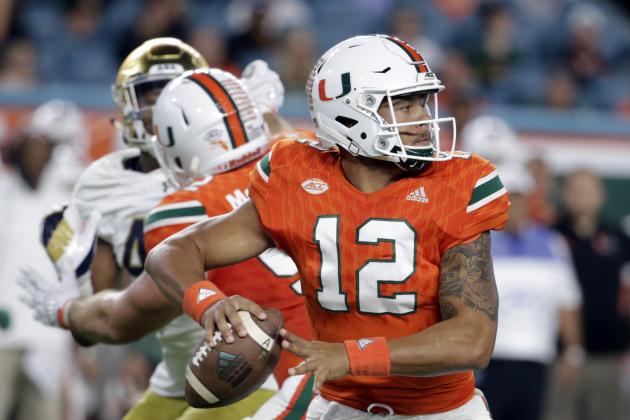Miami quarterback Malik Rosier looks to pass during the first half of an NCAA college football game against Notre Dame, Saturday, Nov. 11, 2017, in Miami Gardens, Fla. (AP Photo/Lynne Sladky)