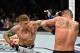 NORFOLK, VA - NOVEMBER 11: (L-R) Dustin Poirier punches Anthony Pettis in their lightweight bout during the UFC Fight Night event inside the Ted Constant Convention Center on November 11, 2017 in Norfolk, Virginia. (Photo by Brandon Magnus/Zuffa LLC/Zuffa LLC via Getty Images)