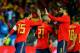 Spain's defender Sergio Ramos (L) celebrates with Spain's defender Gerard Pique (R) after Spain's forward Alvaro Morata scored a goal during the international friendly football match Spain against Costa Rica at La Rosaleda stadium in Malaga on November 11, 2017. / AFP PHOTO / CRISTINA QUICLER (Photo credit should read CRISTINA QUICLER/AFP/Getty Images)