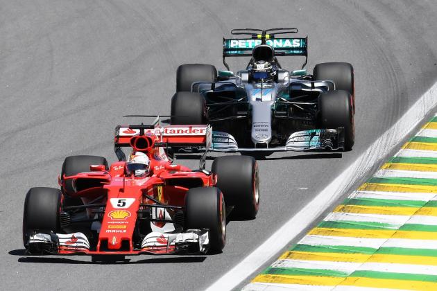 Ferrari's German driver Sebastian Vettel (L) powers his car ahead of Mercedes' Finnish driver Valtteri Bottas during the Brazilian Formula One Grand Prix, at the Interlagos circuit in Sao Paulo, Brazil, on November 12, 2017. / AFP PHOTO / EVARISTO SA        (Photo credit should read EVARISTO SA/AFP/Getty Images)
