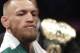 Conor McGregor enters the ring before a super welterweight boxing match against Floyd Mayweather Jr., Saturday, Aug. 26, 2017, in Las Vegas. (AP Photo/Isaac Brekken)