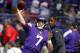Minnesota Vikings quarterback Case Keenum (7) warms up as teammate Teddy Bridgewater, right, looks on before an NFL football game against the Tampa Bay Buccaneers, Sunday, Sept. 24, 2017, in Minneapolis. (AP Photo/Bruce Kluckhohn)