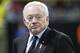 Atlanta Falcons owner Jerry Jones walks the turf inside Mercedes-Benz stadium before the first half of an NFL football game between the Atlanta Falcons and the Dallas Cowboys, Sunday, Nov. 12, 2017, in Atlanta. (AP Photo/David Goldman)
