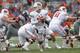 CHAMPAIGN, IL - OCTOBER 28: Alex Hornibrook #12 of the Wisconsin Badgers scrambles out of the pocked during the game against the Illinois Fighting Illini at Memorial Stadium on October 28, 2017 in Champaign, Illinois. (Photo by Michael Hickey/Getty Images)