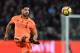Liverpool's German midfielder Emre Can passes the ball during the English Premier League football match between West Ham United and Liverpool at The London Stadium, in east London on November 4, 2017. / AFP PHOTO / Ben STANSALL / RESTRICTED TO EDITORIAL USE. No use with unauthorized audio, video, data, fixture lists, club/league logos or 'live' services. Online in-match use limited to 75 images, no video emulation. No use in betting, games or single club/league/player publications. / (Photo credit should read BEN STANSALL/AFP/Getty Images)