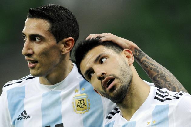 Argentina's Angel Di Maria, left, hugs , Sergio Aguero, as Aguero scored the team's second goal during the international friendly soccer match between Argentina and Nigeria in Krasnodar, Russia, Tuesday, Nov. 14, 2017. (AP Photo/Sergey Pivovarov)