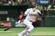 Designated hitter Shohei Ohtani of Japan follows his solo homer in the fifth inning during the international friendly baseball match between Japan and the Netherlands at the Tokyo Dome on November 12, 2016. / AFP / KAZUHIRO NOGI (Photo credit should read KAZUHIRO NOGI/AFP/Getty Images)