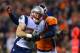 DENVER, CO - NOVEMBER 12: Running back Rex Burkhead #34 of the New England Patriots runs for a touchdown after a catch in the first quarter of a game as free safety Darian Stewart #26 of the Denver Broncos pursues at Sports Authority Field at Mile High on November 12, 2017 in Denver, Colorado. (Photo by Dustin Bradford/Getty Images)