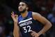 Minnesota Timberwolves center Karl-Anthony Towns celebrates a three-point shot during the second half of an NBA basketball game against the Miami Heat, Monday, Oct. 30, 2017, in Miami. Towns scored 20 points and grabbed 12 rebounds for the Timberwolves as they defeated the Heat 125-122 in overtime. (AP Photo/Wilfredo Lee)