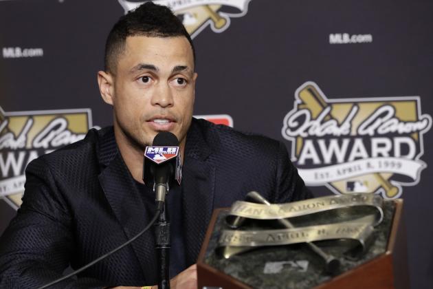 Miami Marlins' Giancarlo Stanton talks after winning the National League Hank Aaron Award at baseball's World Series Wednesday, Oct. 25, 2017, in Los Angeles. (AP Photo/Alex Gallardo)
