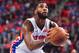 DETROIT, MI - OCTOBER 18: Andre Drummond #0 of the Detroit Pistons shoots a free throw against the Charlotte Hornets during the game on October 18, 2017 at Little Caesars Arena in Detroit, Michigan. NOTE TO USER: User expressly acknowledges and agrees that, by downloading and/or using this photograph, User is consenting to the terms and conditions of the Getty Images License Agreement. Mandatory Copyright Notice: Copyright 2017 NBAE (Photo by Jesse D. Garrabrant/NBAE via Getty Images)