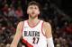 PORTLAND, OR - NOVEMBER 7: Jusuf Nurkic #27 of the Portland Trail Blazers looks on against the Memphis Grizzlies on November 7, 2017 at the Moda Center in Portland, Oregon. NOTE TO USER: User expressly acknowledges and agrees that, by downloading and or using this Photograph, user is consenting to the terms and conditions of the Getty Images License Agreement. Mandatory Copyright Notice: Copyright 2017 NBAE (Photo by Cameron Browne/NBAE via Getty Images)