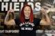 Brazilian-American mixed martial arts superstar, current UFC Women's Featherweight Champion, and Claressa Shields sparring partner, Cris Cyborg, poses before Shields weighs in, Thursday, Aug. 3, 2017, in Detroit. (AP Photo/Carlos Osorio)