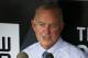 Atlanta Braves President of Baseball Operations John Hart, center, talks with reporters in the dugout before a baseball game against the Pittsburgh Pirates in Pittsburgh, Tuesday, May 17, 2016. (AP Photo/Gene J. Puskar)