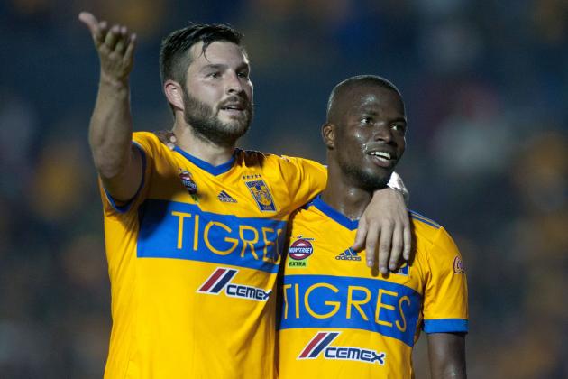Tigres' Enner Valencia (R) celebrates with his teammate Andre Pierre Gignac after scoring against Necaxa during the 2017 Mexican Apertura tournament football match, at Universitario stadium in Monterrey, Mexico on November 5, 2017. / AFP PHOTO / JULIO AGUILAR (Photo credit should read JULIO AGUILAR/AFP/Getty Images)