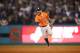 LOS ANGELES, CA - NOVEMBER 01: Jose Altuve #27 of the Houston Astros reacts after a double play during the second inning against the Los Angeles Dodgers in game seven of the 2017 World Series at Dodger Stadium on November 1, 2017 in Los Angeles, California. (Photo by Ezra Shaw/Getty Images)
