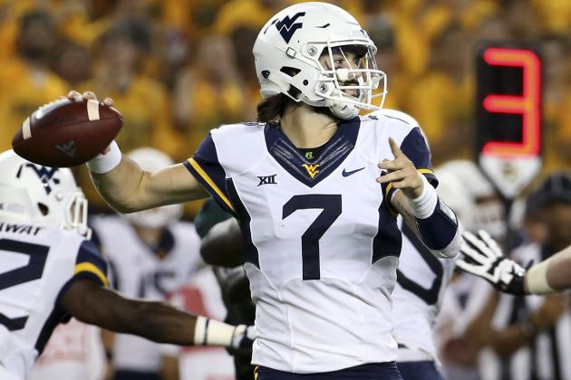FILE - In this Saturday, Oct. 21, 2017, file photo, West Virginia quarterback Will Grier (7) throws a pass in the first half of an NCAA college football game in Waco, Texas. Grier has the most touchdown passes in the nation with 26 and will be going for more when No. 22 West Virginia hosts No. 11 Oklahoma State on Saturday. (AP Photo/Jerry Larson, File)