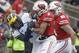 Wisconsin's Kendric Pryor catches a pass in front of Michigan's Josh Metellus during the first half of an NCAA college football game Saturday, Nov. 18, 2017, in Madison, Wis. (AP Photo/Morry Gash)