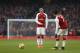Arsenal's German midfielder Mesut Ozil (L) talks to Arsenal's Chilean striker Alexis Sanchez during the English Premier League football match between Arsenal and Tottenham Hotspur at the Emirates Stadium in London on November 18, 2017. / AFP PHOTO / IKIMAGES / Ian KINGTON / RESTRICTED TO EDITORIAL USE. No use with unauthorized audio, video, data, fixture lists, club/league logos or 'live' services. Online in-match use limited to 45 images, no video emulation. No use in betting, games or single club/league/player publications. / (Photo credit should read IAN KINGTON/AFP/Getty Images)