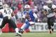 BUFFALO, NY - NOVEMBER 12: Tyrod Taylor #5 of the Buffalo Bills runs with the ball during NFL game action against the New Orleans Saints at New Era Field on November 12, 2017 in Buffalo, New York. (Photo by Tom Szczerbowski/Getty Images)