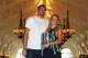 SINGAPORE - OCTOBER 30: Champion Caroline Wozniacki of Denmark poses with the Billie Jean King trophy and American professional basketball player David Lee after her victory against Venus Williams of the United States in the final of the BNP Paribas WTA Finals Singapore presented by SC Global at Clifford Pier on October 30, 2017 in Singapore. (Photo by Clive Brunskill/Getty Images)