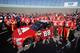HOMESTEAD, FL - NOVEMBER 19: Dale Earnhardt Jr., driver of the #88 AXALTA Chevrolet, and his team take part in pre-race ceremonies for the Monster Energy NASCAR Cup Series Championship Ford EcoBoost 400 at Homestead-Miami Speedway on November 19, 2017 in Homestead, Florida. (Photo by Chris Graythen/Getty Images)