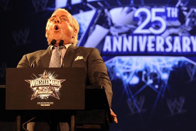 WWE (World Wrestling Entertainment) Hall of Famer Ric Flair  (L) and Chris Jericho during a press conference in New York, March 31, 2009 to promote the 25th Anniversary of WrestleMania to take place at Reliant Stadium in Houston, Texas on April 5th.  AFP PHOTO/ TIMOTHY A. CLARY (Photo credit should read TIMOTHY A. CLARY/AFP/Getty Images)