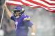 MINNEAPOLIS, MN - NOVEMBER 19: Case Keenum #7 of the Minnesota Vikings carries out an American flag during player introductions before the game against the Los Angeles Rams on November 19, 2017 at U.S. Bank Stadium in Minneapolis, Minnesota. (Photo by Hannah Foslien/Getty Images)