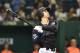 Japan's Shohei Ohtani follows a double in the seventh inning during the international friendly baseball match between Japan and the Netherlands at the Tokyo Dome on November 13, 2016. / AFP / KAZUHIRO NOGI (Photo credit should read KAZUHIRO NOGI/AFP/Getty Images)