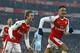 Arsenal's Chilean striker Alexis Sanchez (R) celebrates with Arsenal's Spanish defender Nacho Monreal (2nd L) after scoring their late winner from the penalty spot during the English Premier League football match between Arsenal and Burnley at the Emirates Stadium in London on January 22, 2017.
Arsenal won the game 2-1. / AFP / Ian KINGTON / RESTRICTED TO EDITORIAL USE. No use with unauthorized audio, video, data, fixture lists, club/league logos or 'live' services. Online in-match use limited to 75 images, no video emulation. No use in betting, games or single club/league/player publications. / (Photo credit should read IAN KINGTON/AFP/Getty Images)