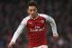 LONDON, ENGLAND - NOVEMBER 18: Mesut Ozil of Arsenal runs with then ball during the Premier League match between Arsenal and Tottenham Hotspur at Emirates Stadium on November 18, 2017 in London, England. (Photo by Shaun Botterill/Getty Images)