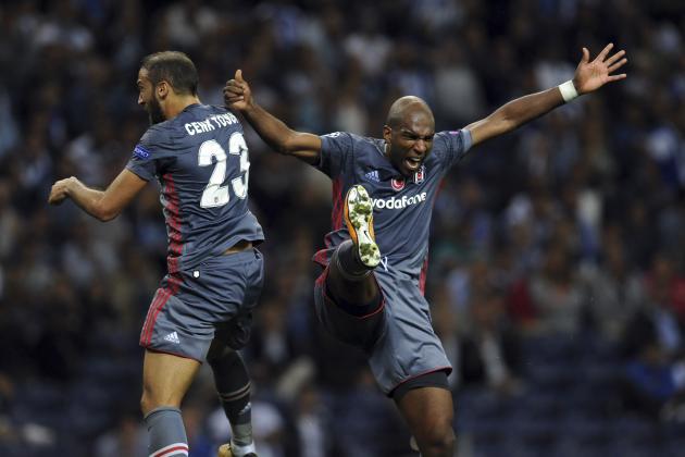 Besiktas' Ryan Babel, right, celebrates with teammate Cenk Tosun after scoring his side's third goal during the Champions League group G soccer match between FC Porto and Besiktas at the Dragao stadium in Porto, Portugal, Wednesday, Sept. 13, 2017. (AP Photo/Paulo Duarte)