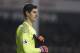 Chelsea goalkeeper Thibaut Courtois pulls on his gloves during the English Premier League soccer match between Tottenham Hotspur and Chelsea at White Hart Lane stadium in London, Wednesday, Jan. 7, 2017. (AP Photo/Alastair Grant)