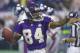 Minnesota Vikings wide receiver Randy Moss points to fans as he celebrates his first quarter touchdown against the New York Giants in Minneapolis, Monday, Nov. 19, 2001. Moss scored three touchdowns as the Vikings beat the Giants 28-16. (AP Photo/Ann Heisenfelt)