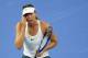 Maria Sharapova of Russia reacts after losing a point to Simona Halep of Romania during their women's singles match in the China Open tennis tournament at the Diamond Court in Beijing, Wednesday, Oct. 4, 2017. (AP Photo/Andy Wong)