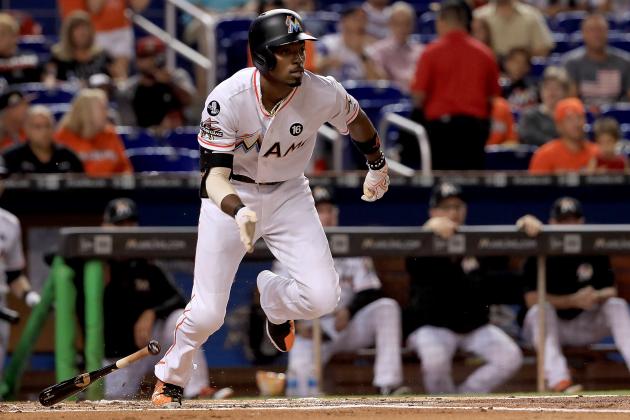MIAMI, FL - SEPTEMBER 30:  Dee Gordon #9 of the Miami Marlins hits a double in the first inning during a game against the Atlanta Braves at Marlins Park on September 30, 2017 in Miami, Florida.  (Photo by Mike Ehrmann/Getty Images)