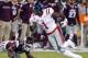 STARKVILLE, MS - NOVEMBER 23: A.J. Brown #1 of the Mississippi Rebels catches a pass as J.T. Gray #12 of the Mississippi State Bulldogs defends during the first half of an NCAA football game at Davis Wade Stadium on November 23, 2017 in Starkville, Mississippi. (Photo by Butch Dill/Getty Images)