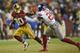 Washington Redskins wide receiver Jamison Crowder (80) pushes New York Giants strong safety Landon Collins (21) back during the second half of an NFL football game in Landover, Md., Thursday, Nov. 23, 2017. (AP Photo/Nick Wass)