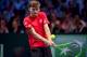 Belgium's David Goffin returns the ball to France's Lucas Pouille during the Davis Cup World Group singles rubber final tennis match between France and Belgium at The Pierre Mauroy Stadium in Lille on November 24, 2017. / AFP PHOTO / PHILIPPE HUGUEN (Photo credit should read PHILIPPE HUGUEN/AFP/Getty Images)