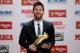 Barcelona's Argentinian forward Lionel Messi poses with the 2017 European Golden Shoe honoring the year's leading goalscorer during a ceremony at the Antigua Fabrica Estrella Damm in Barcelona on November 24, 2017. / AFP PHOTO / Josep LAGO (Photo credit should read JOSEP LAGO/AFP/Getty Images)