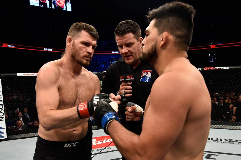 SHANGHAI, CHINA - NOVEMBER 25: (L-R) Opponents Michael Bisping of England and Kelvin Gastelum face offprior to their middleweight bout during the UFC Fight Night event inside the Mercedes-Benz Arena on November 25, 2017 in Shanghai, China. (Photo by Brandon Magnus/Zuffa LLC via Getty Images)