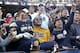 Pittsburgh offensive lineman Brian O'Neill (70) celebrates with fans in the student section after defeating Miami in an NCAA college football game, Friday, Nov. 24, 2017, in Pittsburgh. Pittsburgh upset number 2 ranked Miami, 24-14. (AP Photo/Keith Srakocic)