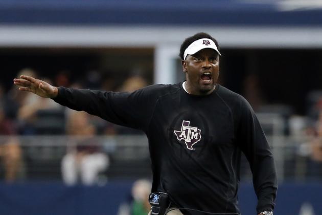 FILE - In this Sept. 23, 2017, file photo, Texas A&M head coach Kevin Sumlin talks to an official, not pictured, after a call during an NCAA college football game against Arkansas, in Arlington, Texas. Florida hosts Texas A&M on Saturday. (AP Photo/Tony Gutierrez, File)