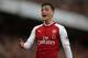 Arsenal's German midfielder Mesut Ozil gestures during the English Premier League football match between Arsenal and Swansea City at the Emirates Stadium in London on October 28, 2017. / AFP PHOTO / Daniel LEAL-OLIVAS / RESTRICTED TO EDITORIAL USE. No use with unauthorized audio, video, data, fixture lists, club/league logos or 'live' services. Online in-match use limited to 75 images, no video emulation. No use in betting, games or single club/league/player publications. / (Photo credit should read DANIEL LEAL-OLIVAS/AFP/Getty Images)