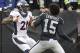 Denver Broncos cornerback Aqib Talib (21) fights Oakland Raiders wide receiver Michael Crabtree (15) during the first half of an NFL football game in Oakland, Calif., Sunday, Nov. 26, 2017. (AP Photo/Ben Margot)